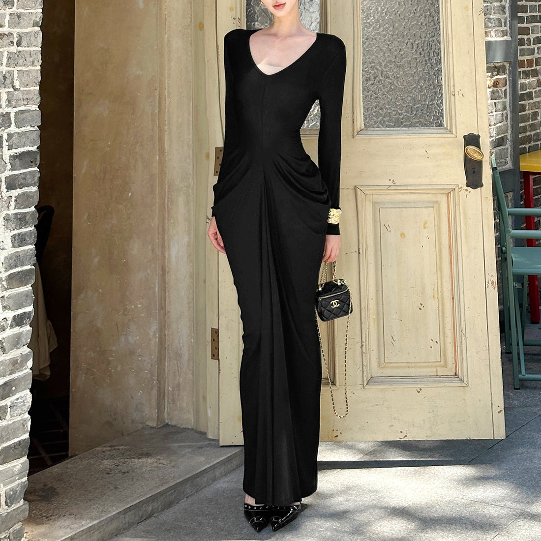 Wrinkled temperament long sleeved sexy waist cinched V-neck slim solid color dress
