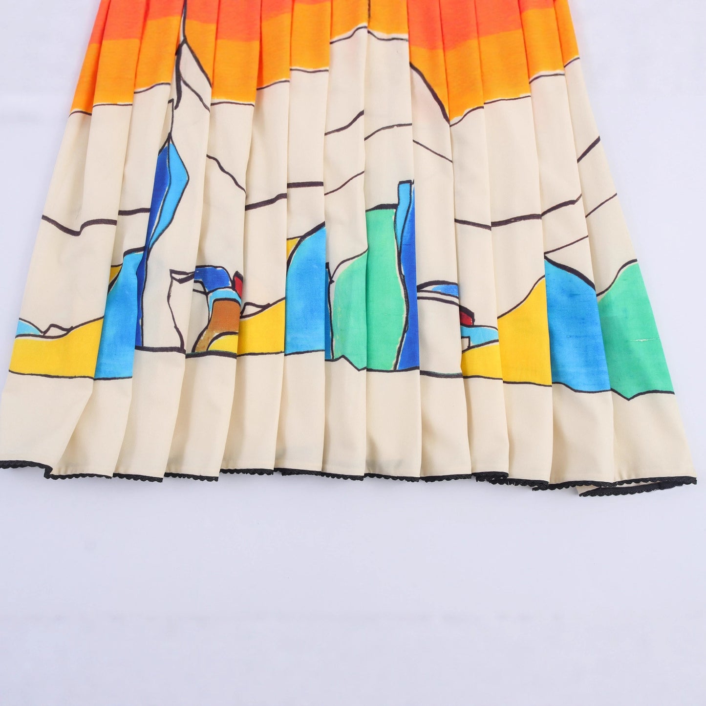 Wide pleated mid length printed skirt for women