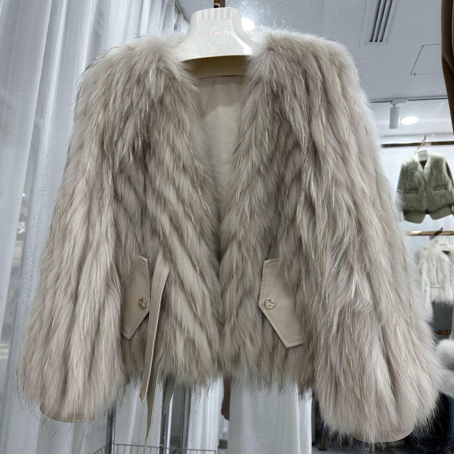 Raccoon fur grass coat, woven with car stripes, women's short jacket, Haining autumn and winter new small fresh and stylish, age reducing